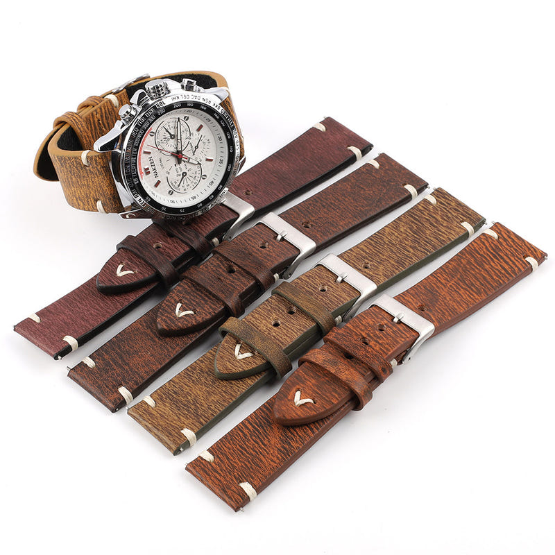 Patterned leather watch straps with metal buckles in brown and red tones