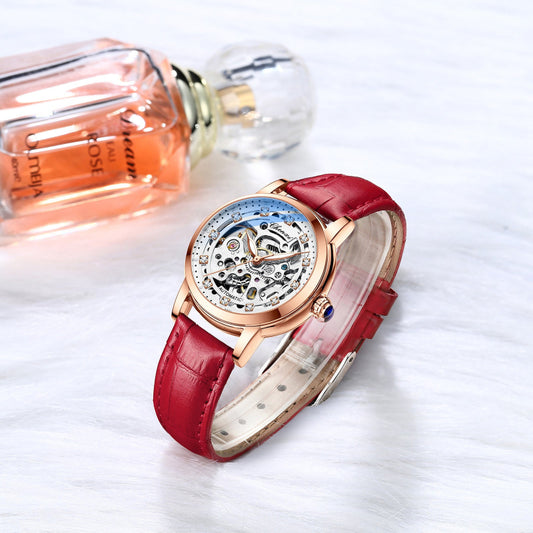 Watch with red strap and rose gold case. YAXSO UAE ONLINE STORE
