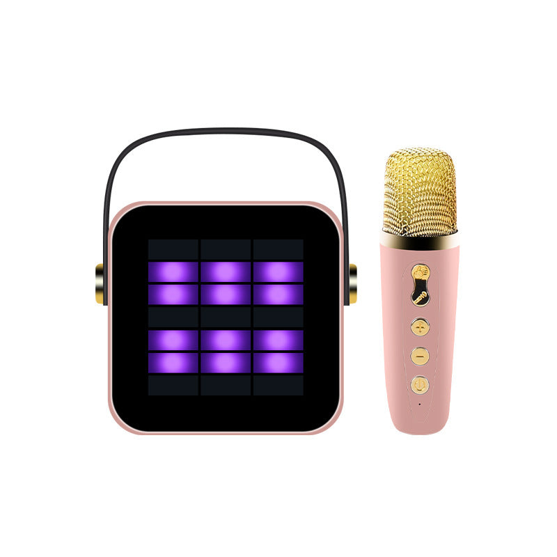 Portable speaker with LED display and pink mesh handheld microphone