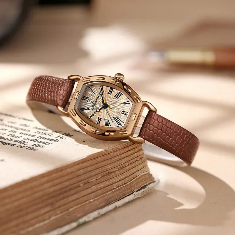 Women’s leather strap watch with rose gold case, Roman dial, brown textured strap