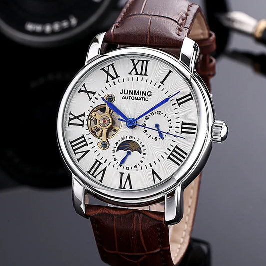 Automatic mechanical watch with white Roman numeral dial, skeleton details, and brown leather strap