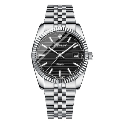 Silver wristwatch with black dial on a white background