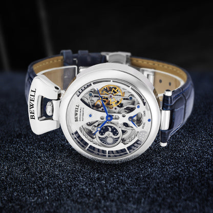 Watch with blue strap and visible brand name on a dark background