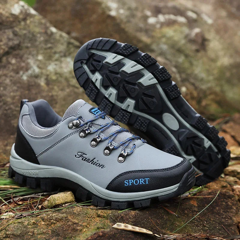 Women's non-slip outdoor shoes in light gray with blue laces, lace-up tread sole