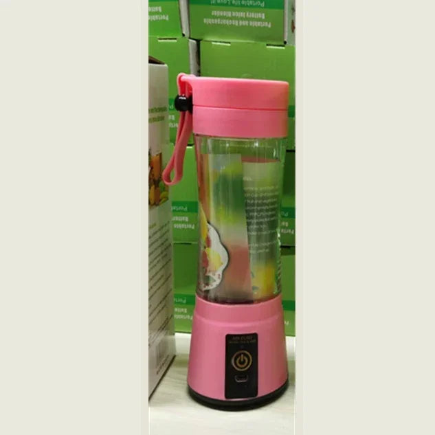 Portable USB rechargeable blender in pink with clear cup and black control base