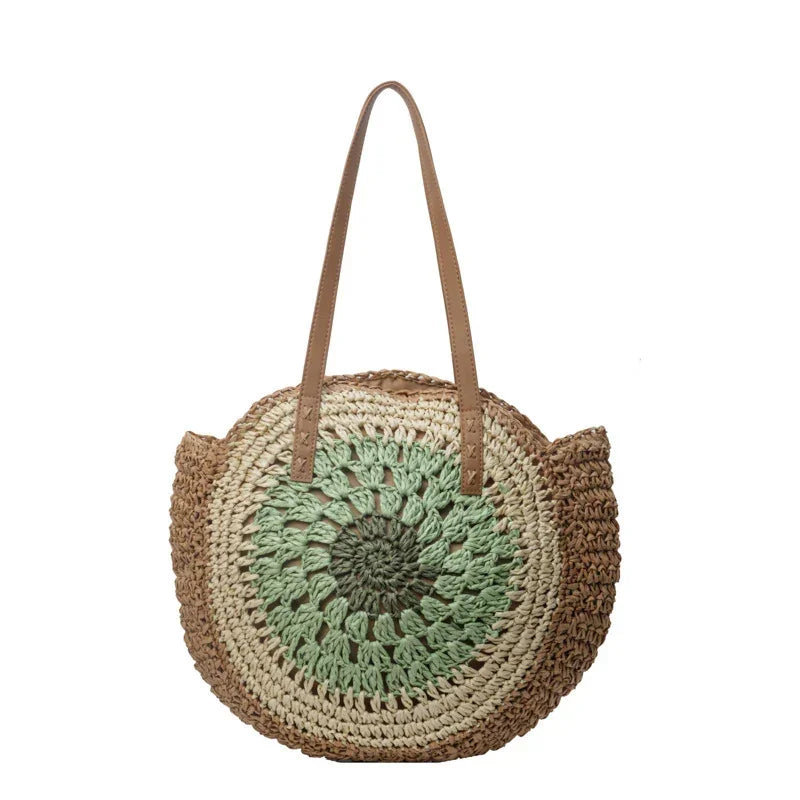 Crochet straw tote bag with mint green round floral center and brown leather handles