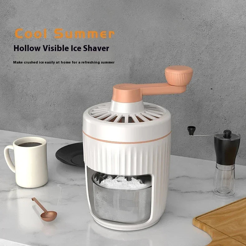 Hand-cranked ice crusher with orange crank handle and knob, white body, clear ice chamber
