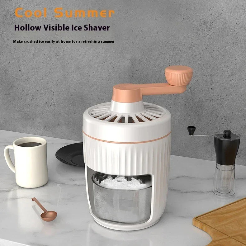Hand-cranked ice crusher with orange crank handle and knob, white body, clear ice chamber