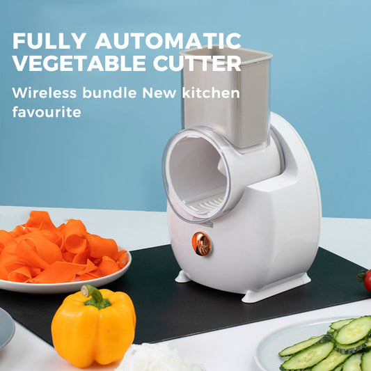 Fully automatic vegetable cutter with sliced vegetables.  YAXSO STORE UAE