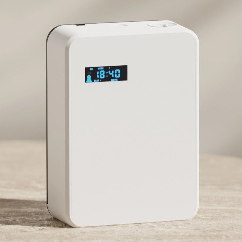 White electronic device with digital display on a neutral background