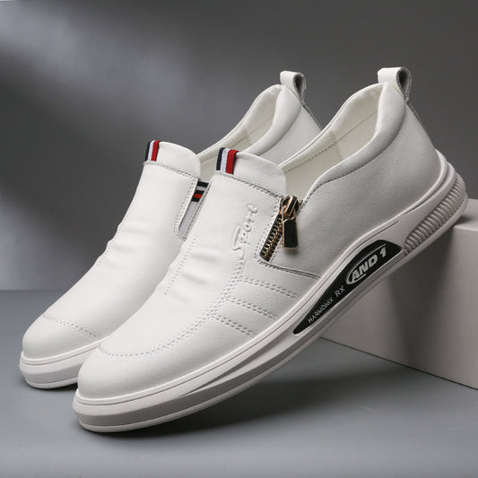 White sneakers with a gold zipper on a gray background