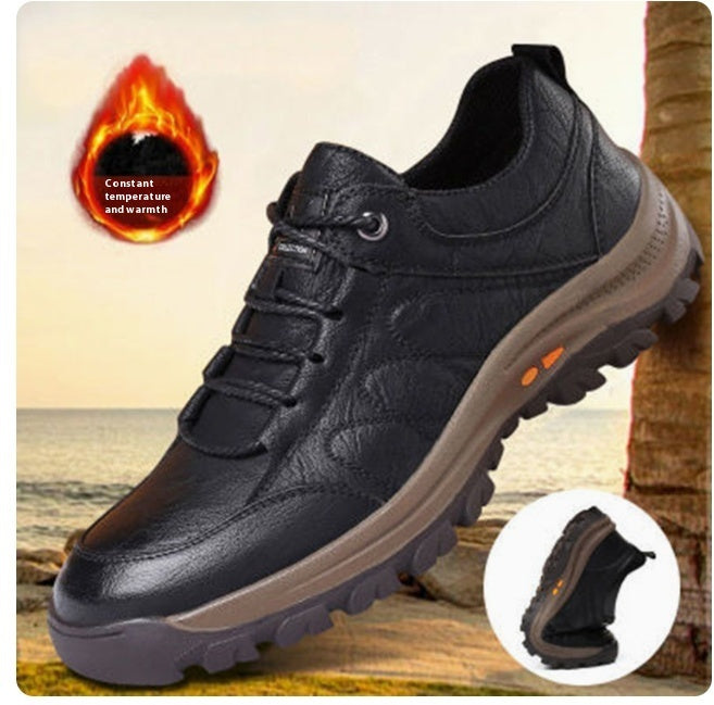 Men's leather hiking shoes in black, lace-up with thick sole and orange accent on side