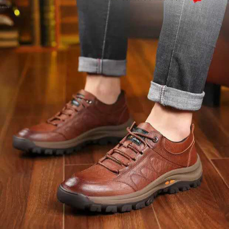 Men's leather hiking shoes in brown, lace-up styling with rugged outsole
