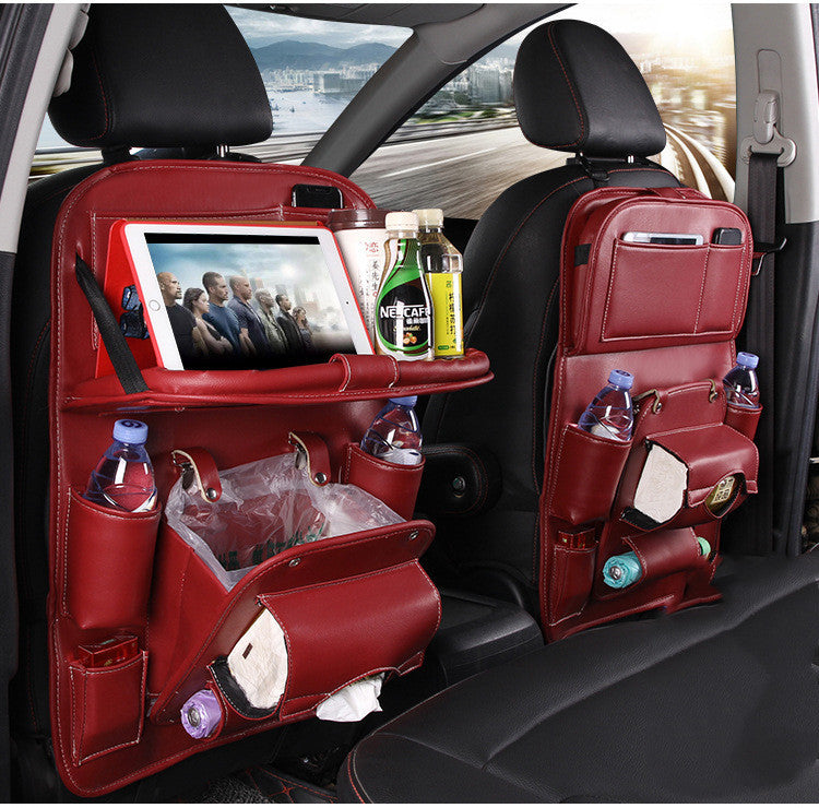 Red PU leather car seat back organizer with tray, tablet pocket, and bottle storage