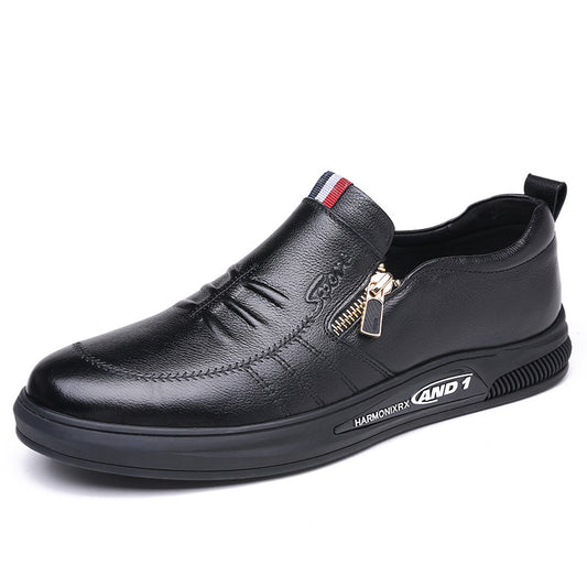 Black leather shoe with a zipper on a white background
