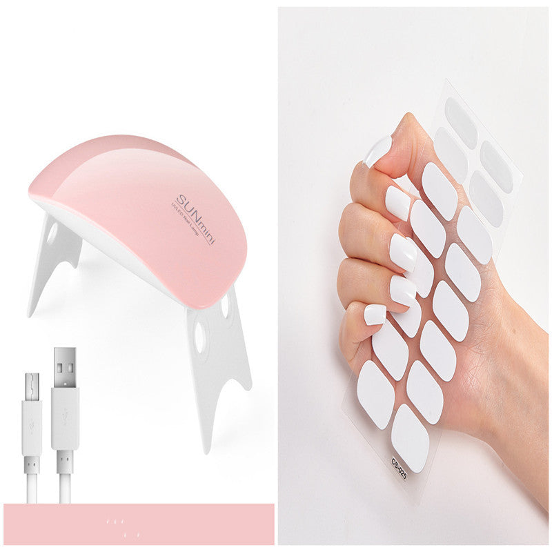 Pink device with USB cable, white foot pads on a hand, and 'SUN' branding.