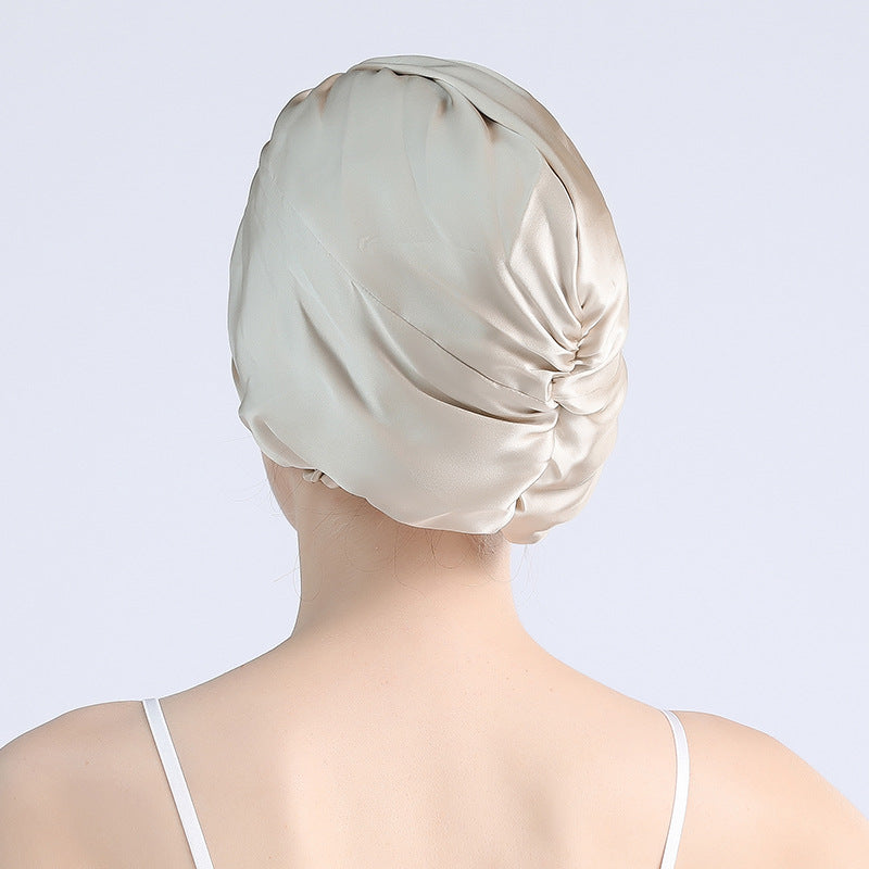 Women's satin cross nightcap, ivory turban back view with gathered knot
