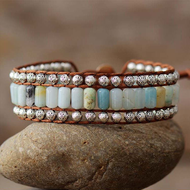 Blue-green stone beaded bracelet with brown leather and silver-tone bead rows
