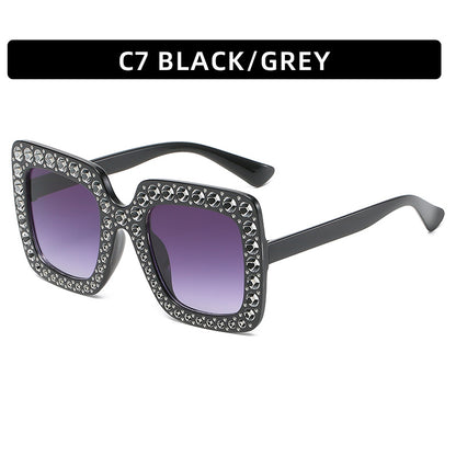 Square rhinestone sunglasses with black frame and gray tinted lenses