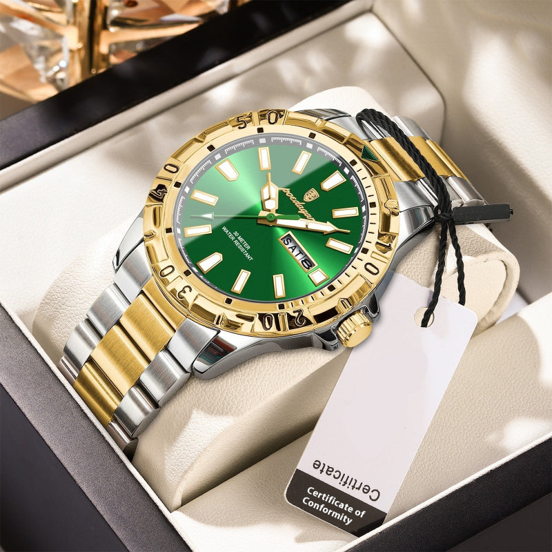 Luxury watch with green face and gold and silver band in a box
