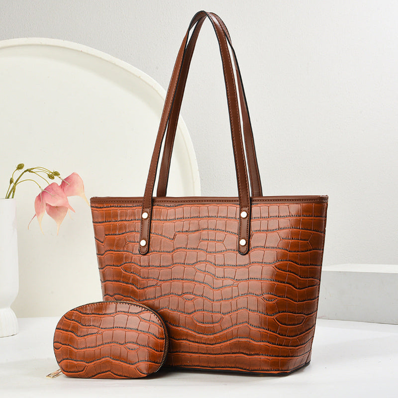 Brown croc-texture PU tote with zip pouch, wide handles, snap-front strap