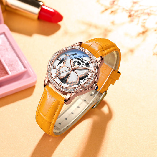 Yellow wristwatch with a pink box and red lipstick. YAXSO UAE ONLINE STORE
