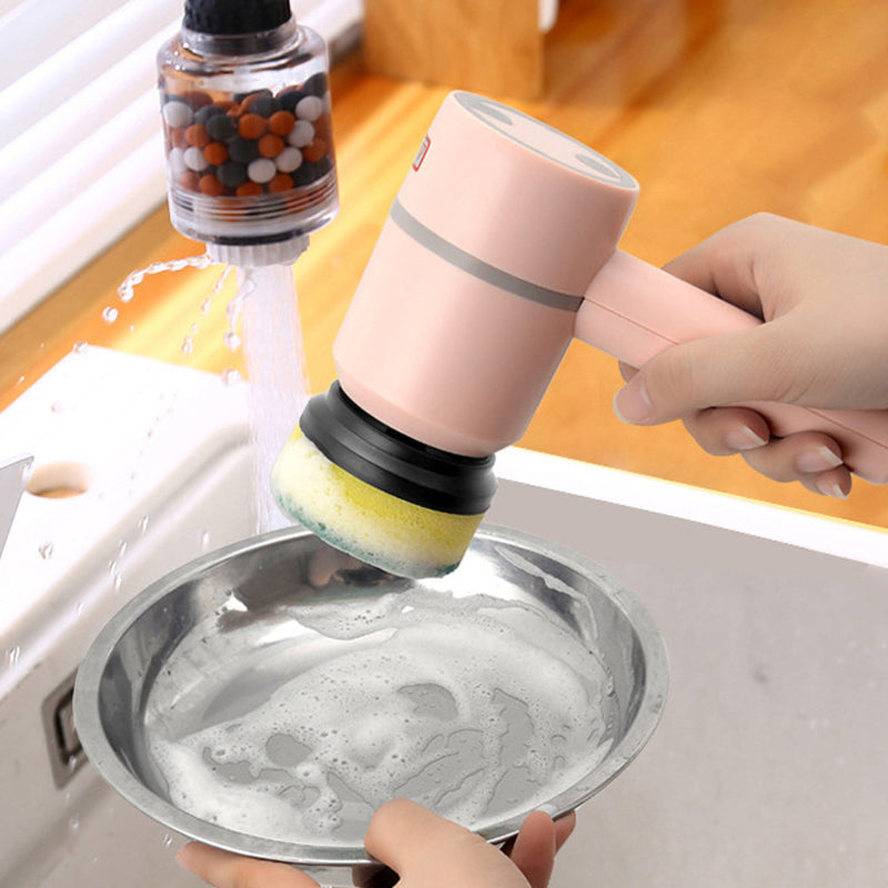 Handheld electric cleaning brush scrubbing a sink with round sponge head