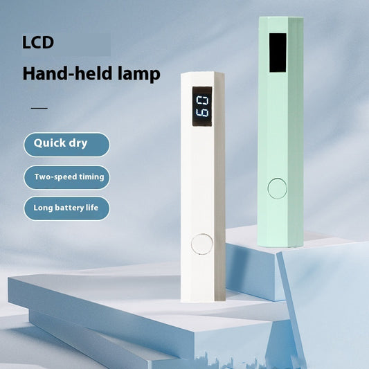 Hand-held lamp with LCD display on a light blue background
