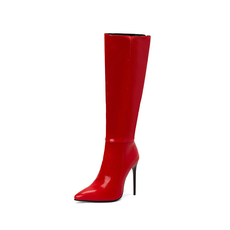 Red pointed-toe stiletto boots with side zipper, below-knee height