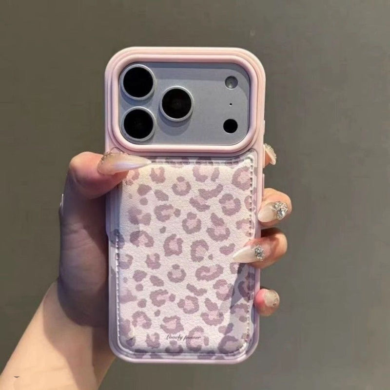 Pink leopard-print phone case with lavender bumper and camera cutouts on the back