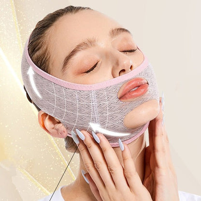 Adjustable face wrap with gray fabric and pink edge, geometric pattern.