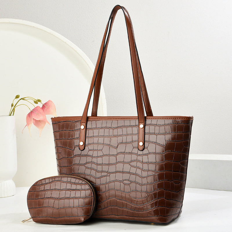Dark brown croc-texture PU tote with zip pouch, wide handles, snap-front strap