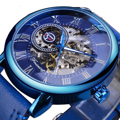 Blue mechanical watch with transparent face on a white background