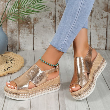 Women's Gold sandals worn with light blue jeans.  YAXSO STORE UAE