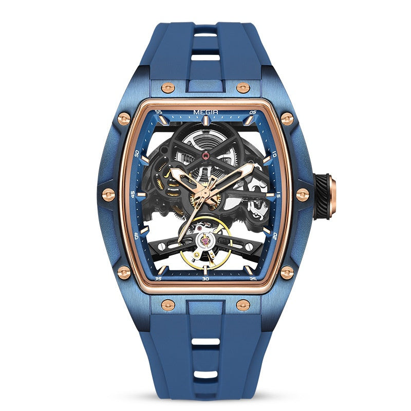 Blue mechanical watch with rose gold accents on a white background