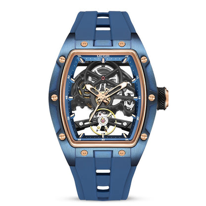 Blue mechanical watch with rose gold accents on a white background
