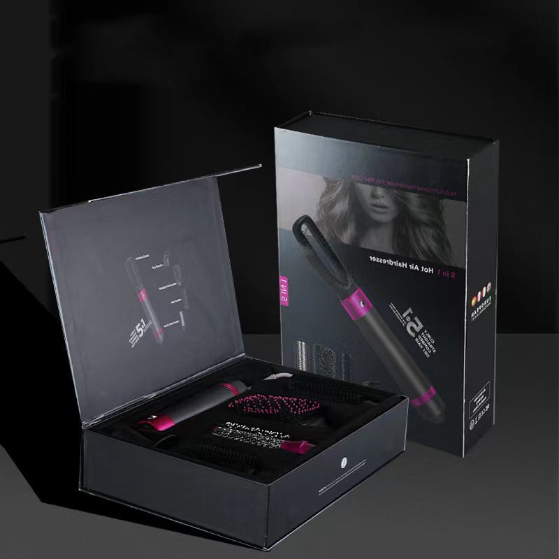 Hair straightener in open packaging with closed packaging in the background