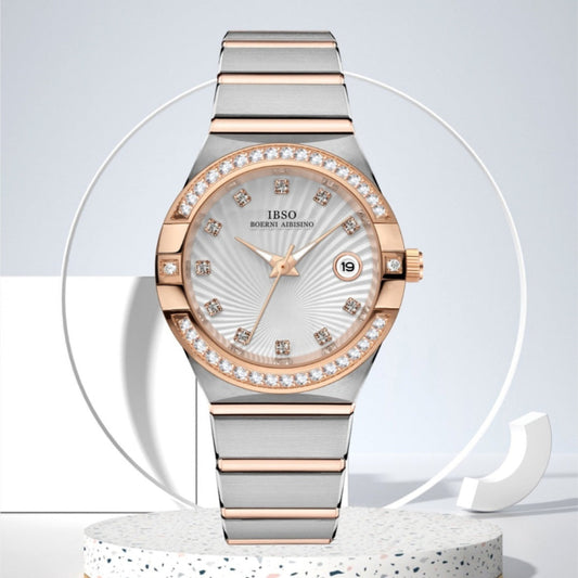 Luxury watch with rose gold and silver band on a white background