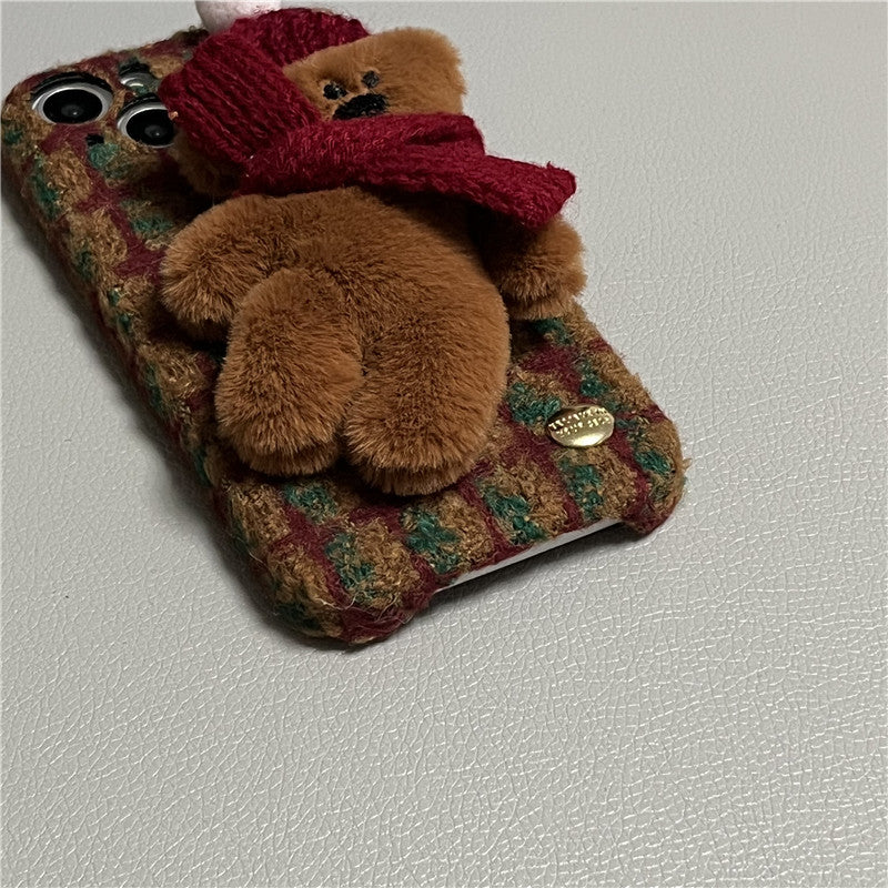Plush plaid iPhone case with brown teddy bear plush and maroon scarf, camera cutouts