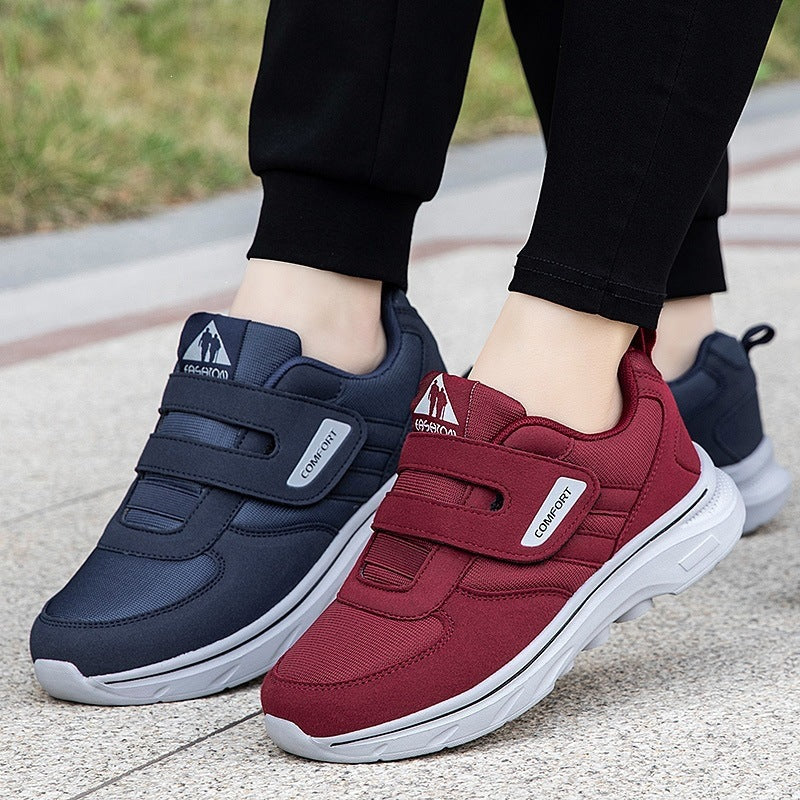 Pair of lightweight casual sneakers: purplish red and dark blue, each with hook-and-loop straps