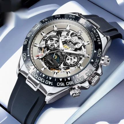 Luxury watch with black strap and silver case on a light blue background