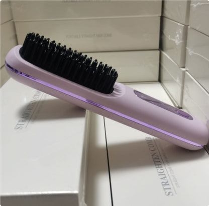 Purple hair straightening brush with black bristles on a white surface.