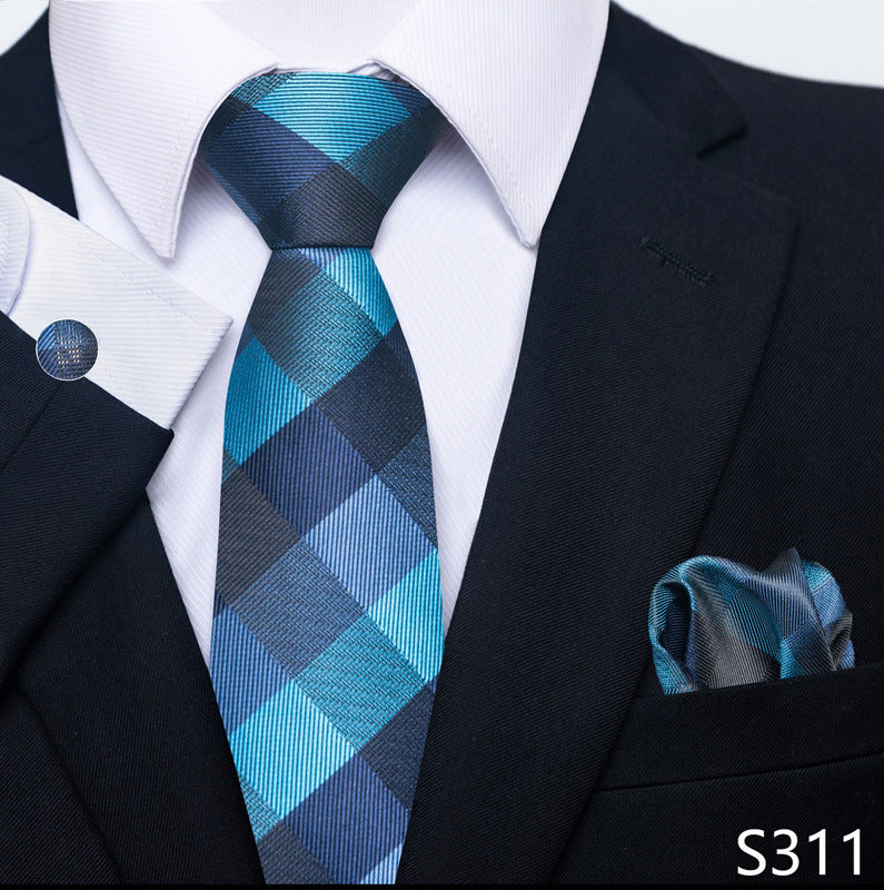 Teal and dark plaid striped tie set with matching pocket square and round cuff links.