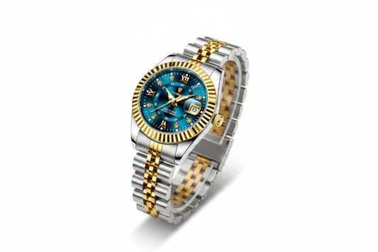 Luxury watch with blue face and gold accents on a display box