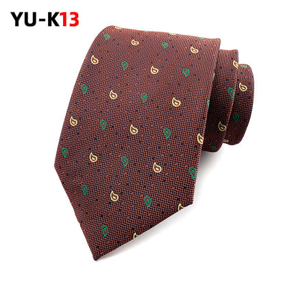 Brown patterned tie on a white background with 'YU-K13' branding.