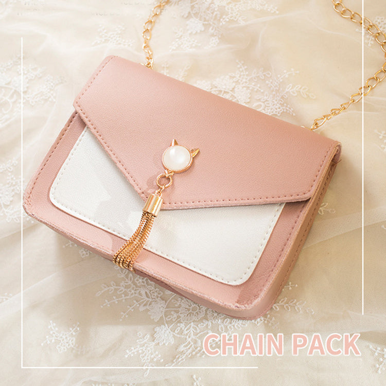 Light pink and white small square chain crossbody bag with gold cat-style clasp