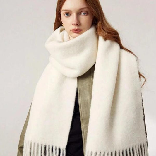 Women's wool-like scarf, white, fringed ends, draped over shoulders in a soft loop