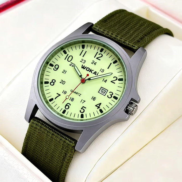 Quartz wristwatch with olive canvas strap and lime green dial, date window at 3 o’clock.