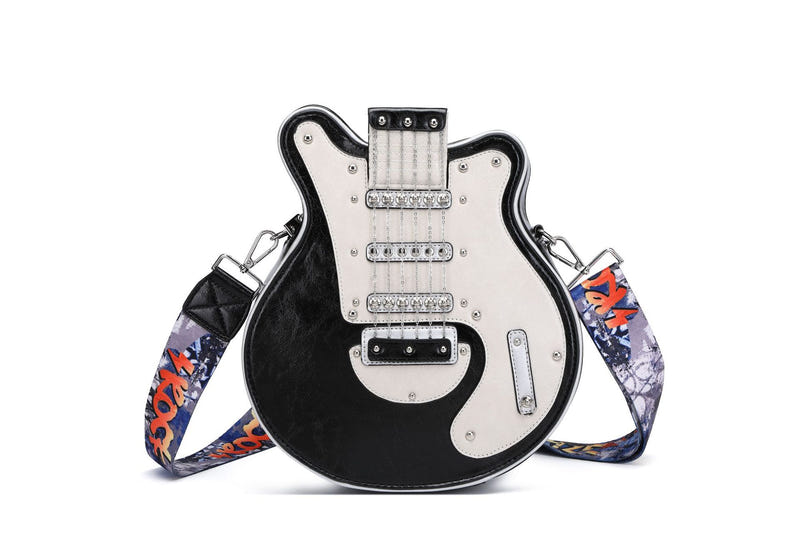Guitar-shaped crossbody bag with black-and-white front and patterned shoulder strap