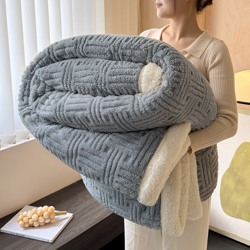 Plush velvet winter blanket in charcoal gray with textured stripes and cream plush backing